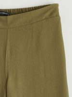 Effortless elegance meets everyday comfort in our wide-leg trousers with a flexible waistband. - Image 6