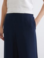 Effortless elegance meets everyday comfort in our wide-leg trousers with a flexible waistband. - Image 9