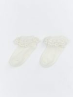 Baby girl's two-pack of socks with lace detailing.