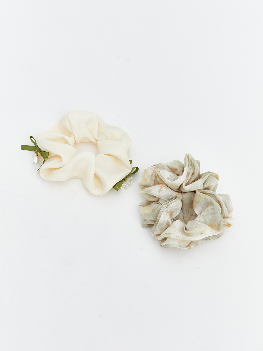 l_20261-s69617z8-m0t_a.jpg Floral Hair Clips, Set of Two - Image 1
